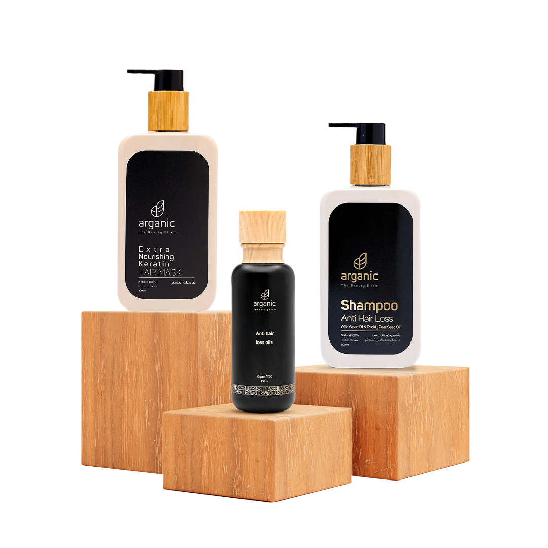 Assortment of Arganic hair care products on wooden blocks
